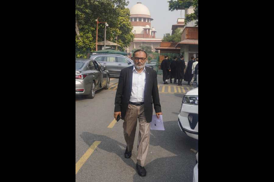 Umar Khalid’s father, Syed Qasim Rasool Ilyas, outside the Supreme Court on Monday.