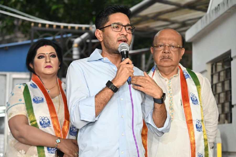 Sovan Chatterjee and his 'close associate' Baisakhi Bandyopadhyay with Abhishek Banerjee in Calcutta on Monday