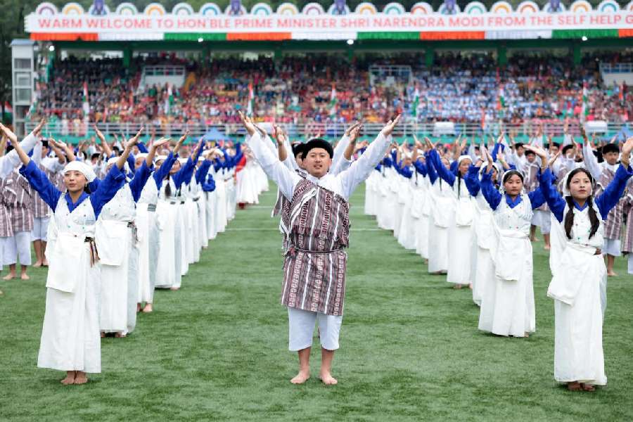 Members of the Lepcha community of Sikkim perform in their traditional dress during the State Day celebations in May at the Paljor Stadium, Gangtok.