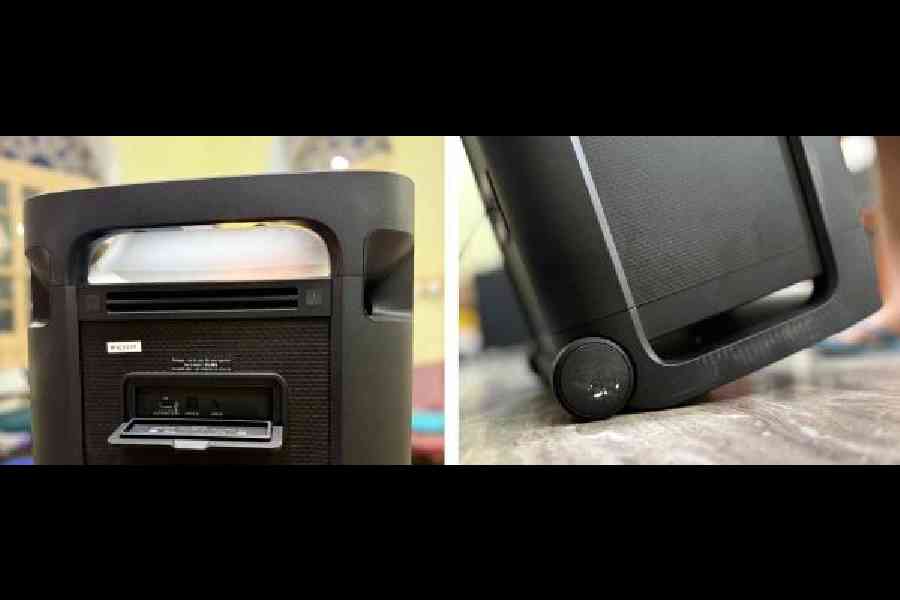 A few of the ports on the device (left) and larger castors make this speaker easy to move