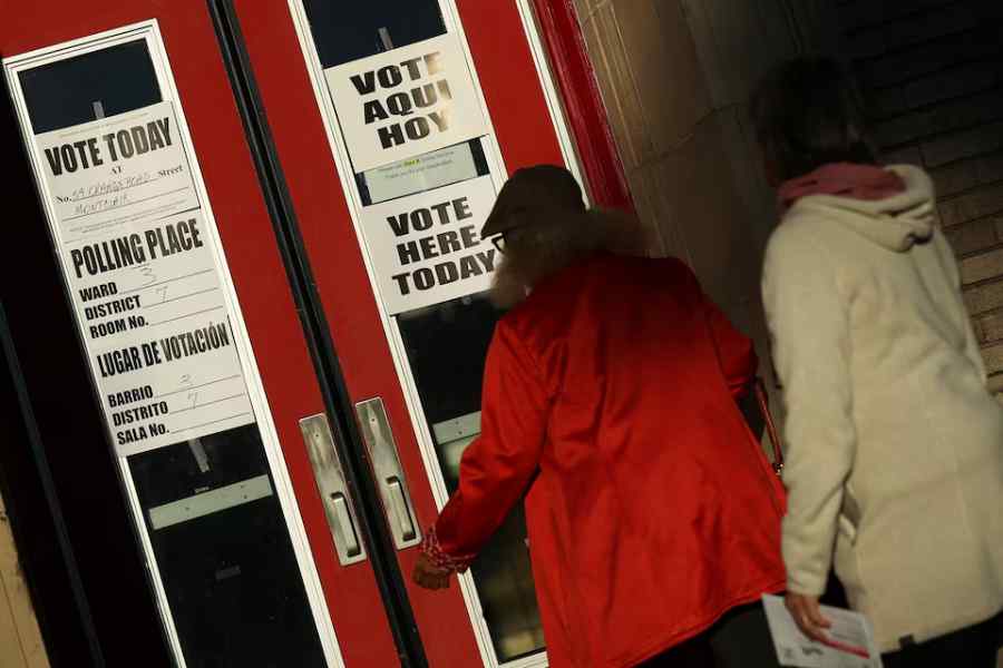 Voters arrive at a polling site early on Election Day in Montclair, New Jersey, U.S., November 4, 2025.
