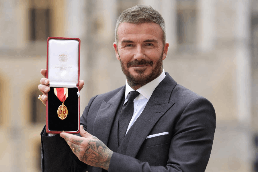 Sir David Beckham stands after he was made a Knight Bachelor at an investiture ceremony at Windsor Castle, Berkshire. November 4, 2025.