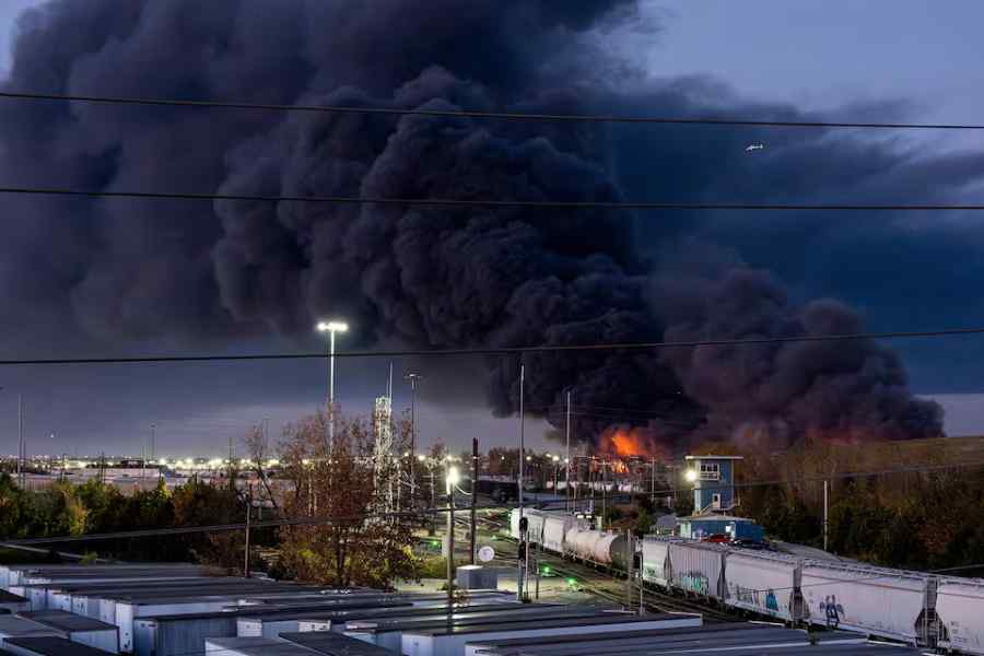 Smoke rises from the wreackage of a UPS MD-11 cargo jet after it crashed on departure from Louisville Muhammad Ali International Airport in Louisville, Kentucky, U.S. November 4, 2025.