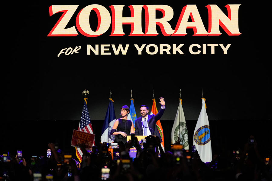 Mayor-elect Zohran Mamdani, right, and his wife Rama Duwaji react to supporters during an election night watch party, Tuesday, Nov. 4, 2025, in New York.