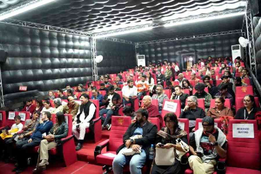 The audience at a screening inside a Mobile Digital Movie Theatre, a venture of Picturetime