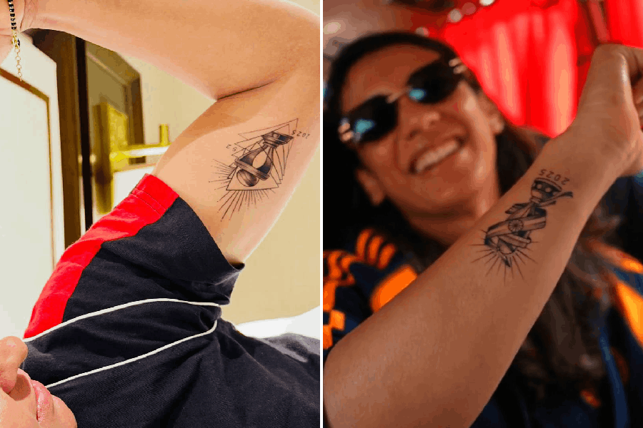 Harmanpreet Kaur (left) flaunts her World Cup tattoo, Smriti Mandhana (right)