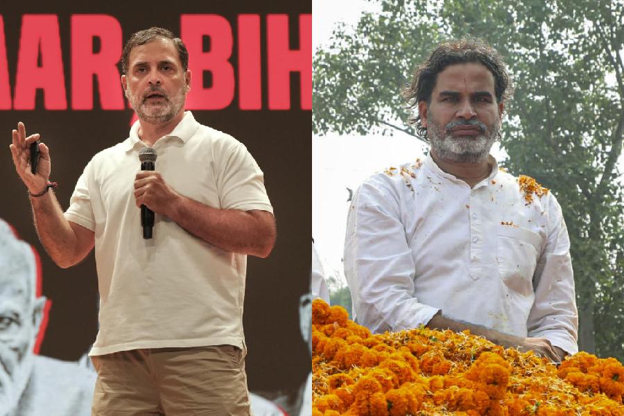 Rahul Gandhi (left), Prashant Kishor