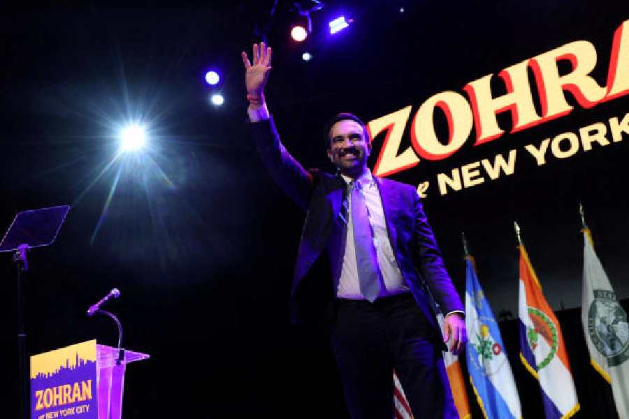 Zohran Mamdani waves on stage after winning the 2025 New York City Mayoral race, in New York City on 4 November.