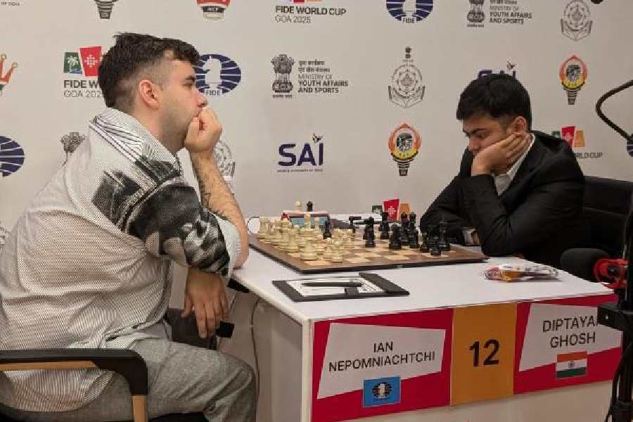 India's grandmaster Diptayan Ghosh (right) mulls over his next move as Russian GM Ian Nepomniachtchi waits during Wednesday's Round II of the Chess World Cup in Goa. 