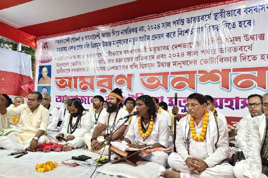 Matua devotees sit on fast-unto-death against the ongoing SIR exercise in Thakurnagar, North 24-Parganas, on Wednesday. 