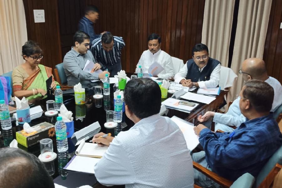 Members of the PAC with others at the state guest house in Jalpaiguri on Wednesday. 