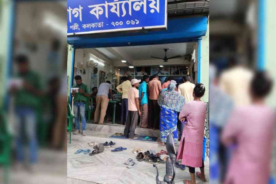 Voters at the office of Partha Sarkar, the councillor of            Ward 128 in Behala, on Thursday afternoon.