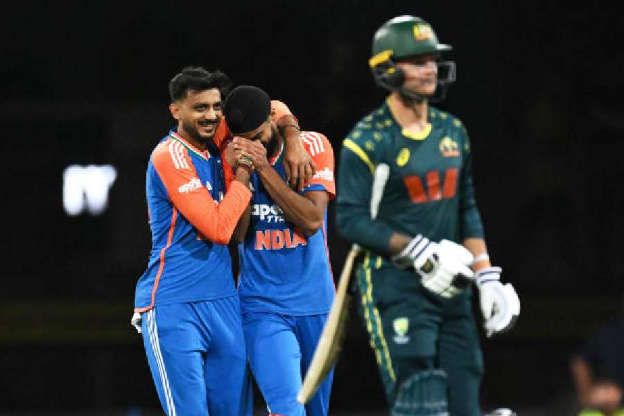 Axar Patel and Arshdeep Singh celebrate the wicket of Josh Philippe in India’s victory in the fourth T20I against Australia in Carrara, Gold Coast, on Thursday.
