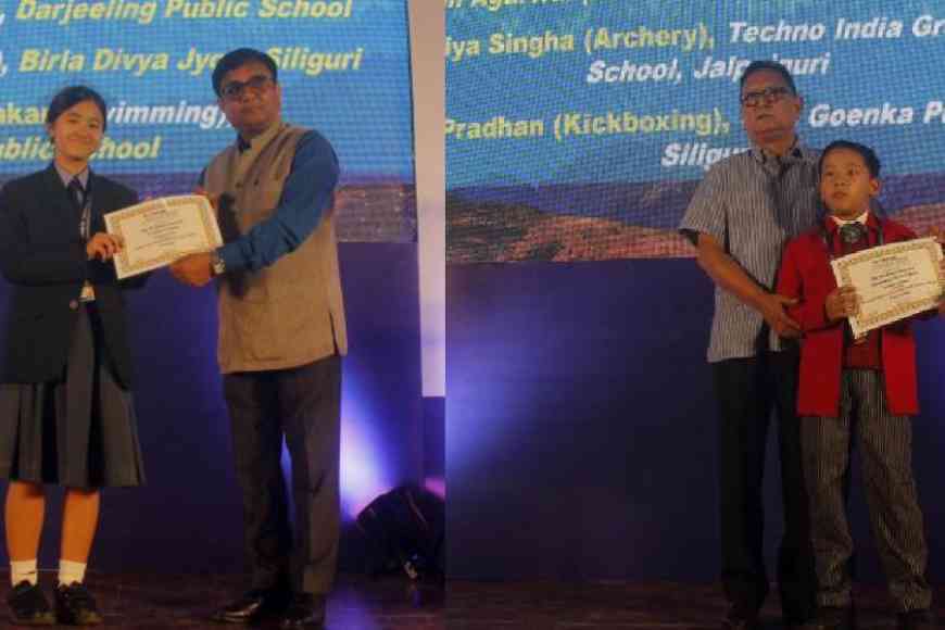 Palmu Dolma Sherpa of Birla Divya Jyoti, Siliguri, receives the certificate of merit for outstanding talent in sports, Atharva Kachari of G.D. Goenka Public School, Siliguri, receives the certificate of honour for outstanding talent in sports