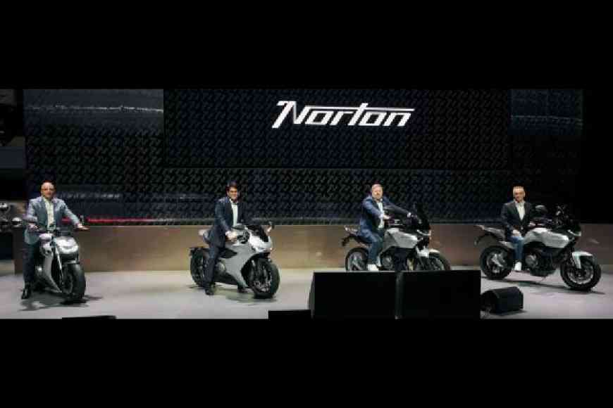 (L-R) Sharad Mohan Mishra, president, group strategy, TVS Motor Company; Sudarshan Venu, chairman, TVSM; and Richard Arnold and Nevijo Mance, both executive directors, Norton Motorcycles, at the reveal of the new Norton product range at EICMA 2025 in Milan