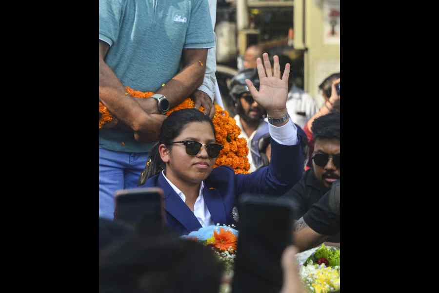 Richa Ghosh, member of the Women's ODI World Cup 2025-winning Indian cricket team, arrives in her hometown, Siliguri, West Bengal, Friday, Nov. 7, 2025.