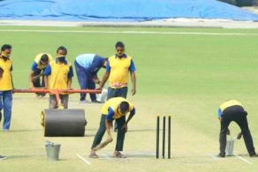 A file picture of Eden groundsmen working on the pitch.