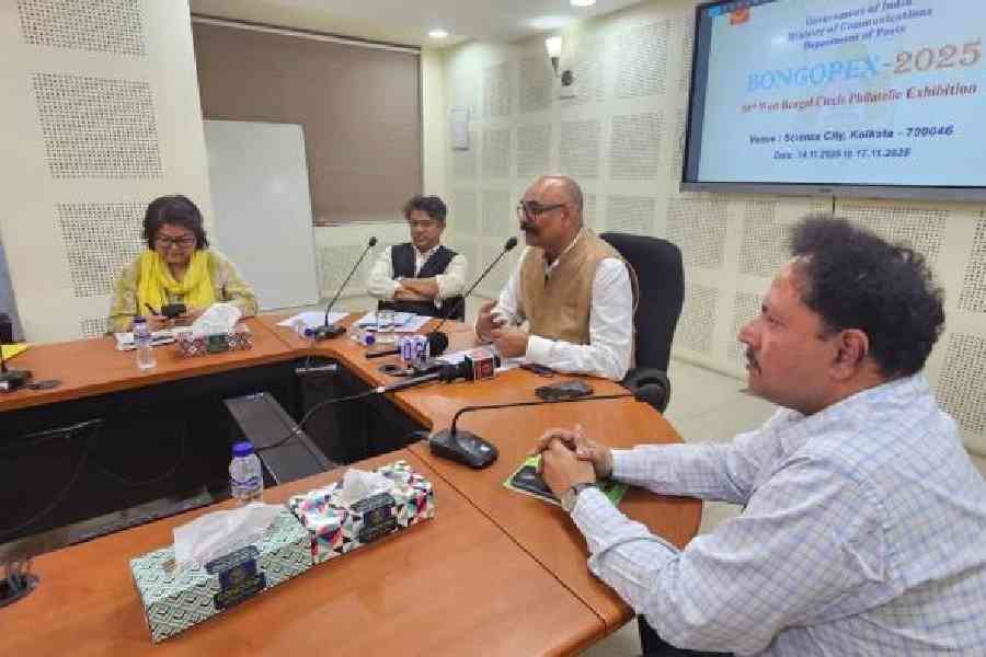 Chief post master general, West Bengal circle, Ashok Kumar addresses the meeting on Bongopex as (from left) assistant director, philately, Sudarshana Sen, post master general, mail and business development, Supriyo Ghosh and post master general, south Bengal, Riju Ganguly look on at Yogayog Bhavan on Monday. Picture by Sudeshna Banerjee
