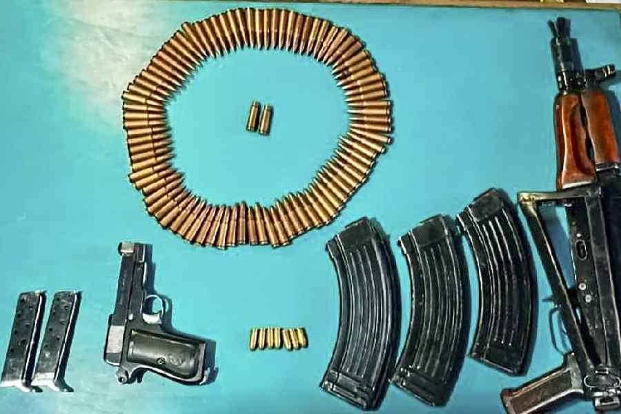 Some of the arms and ammunition seized during the raid at Dr Muzammil Ahmad Ganai’s Faridabad home on Monday.