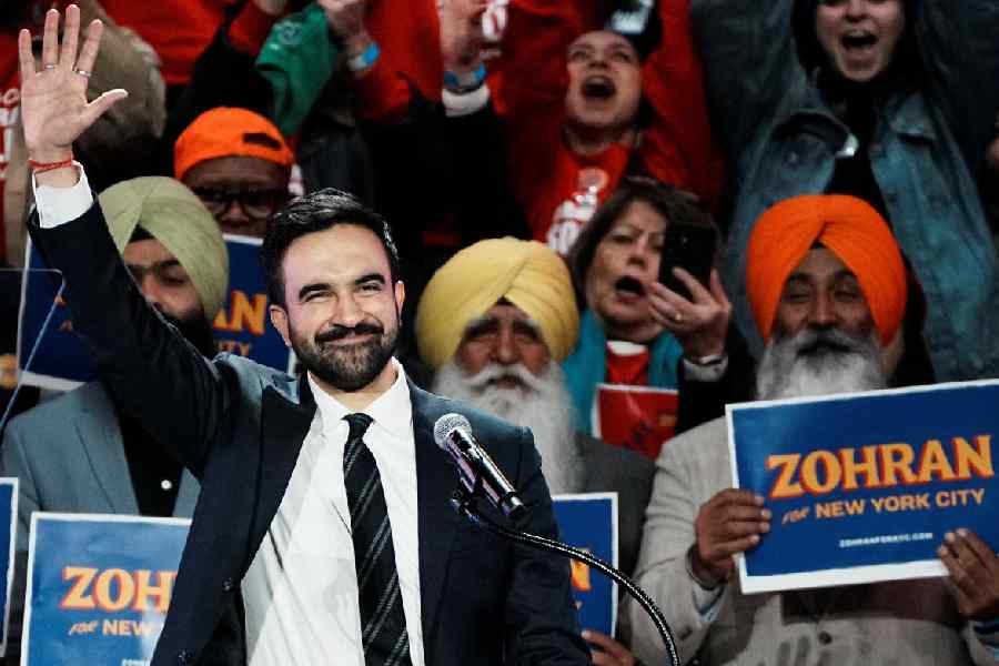 Zohran Mamdani waves during a 'New York is Not For Sale' rally at Forest Hills Stadium, in the Queens borough of New York City.