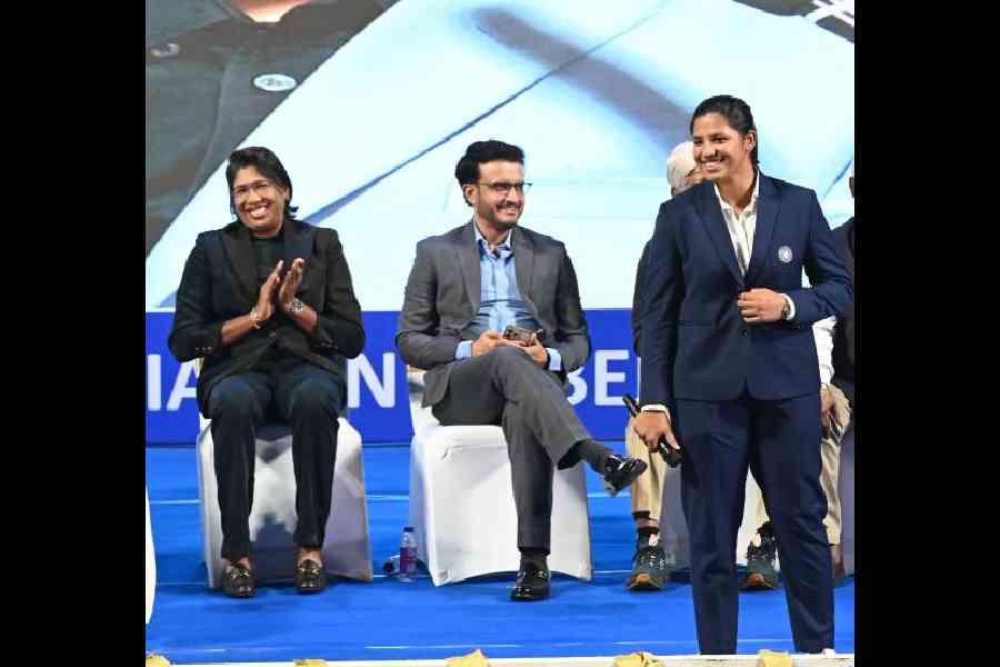 (L-R) Jhulan Goswami, Sourav Ganguly and Richa Ghosh at Eden Gardens on Saturday