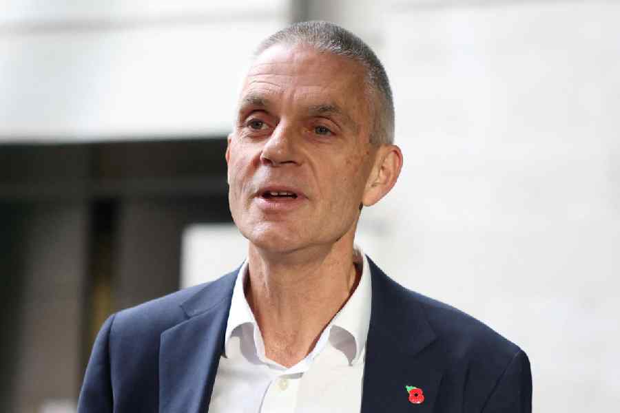 Outgoing Director General of the BBC Tim Davie speaks to the media outside BBC Broadcasting House, after he and Chief Executive of BBC News Deborah Turness resigned following accusations of bias at the British broadcaster, including in the way it edited a speech by U.S. President Donald Trump, in London, Britain, November 11, 2025.