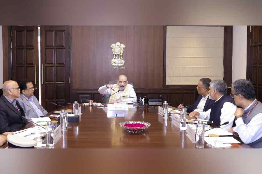 In this image received on Nov. 11, 2025, Union Home Minister Amit Shah chairs a high-level security review meeting, in New Delhi.