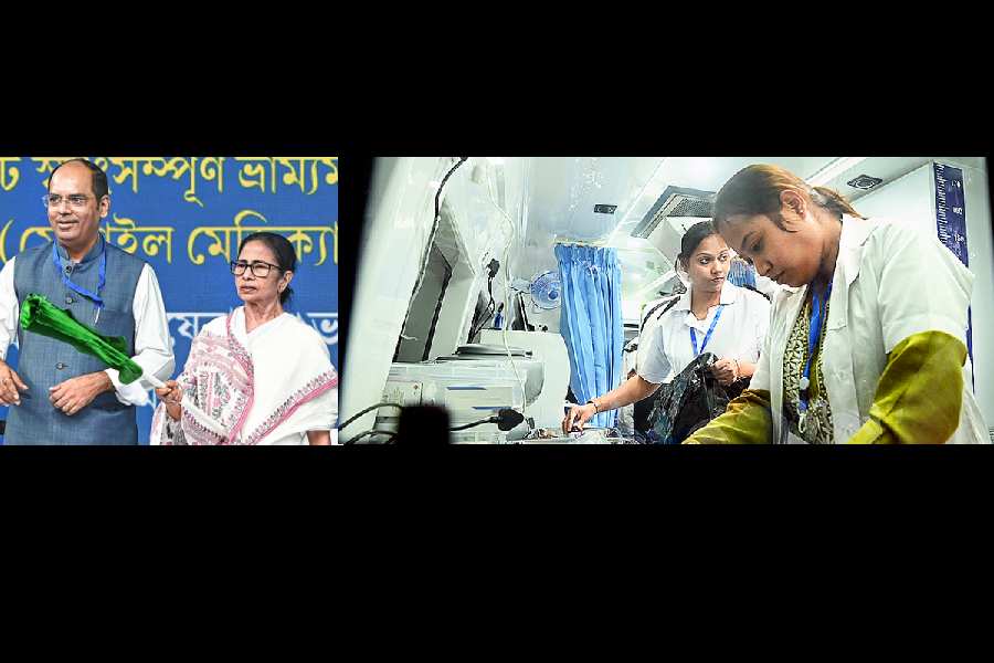 Chief minister Mamata Banerjee flags off a mobile medical unit — part of the 110 such units — at Swasthya Bhavan on Tuesday. The units (picture right) will have facilities to conduct ECGs, blood tests, pregnancy tests, and liver function tests, among other diagnostic procedures. “These vans will be like an independent clinic with doctors and nurses. They will go to remote corners of the state,” said an official. Mamata said 210 such units will be launched. “We spent ₹84 crore for this project,” she said.