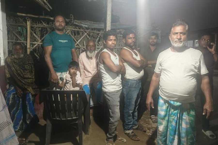 BLO Anjum Alam (extreme left) with residents of Kalagach village in Kishanganj on Sunday. 