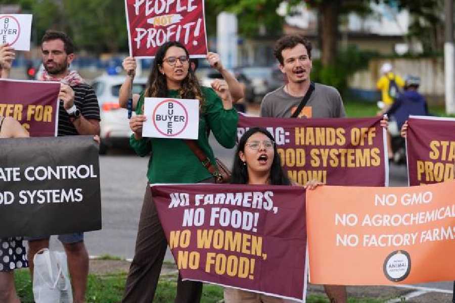 Demonstrators protest against big agribusiness outside the venue for the COP30 UN Climate Summit in Belem, Brazil, on Monday. 
