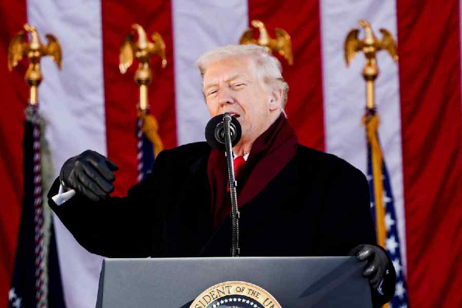 US President Donald Trump speaks during a Veterans Day ceremony at Arlington National Cemetery in Arlington, Virginia, US, November 11, 2025.