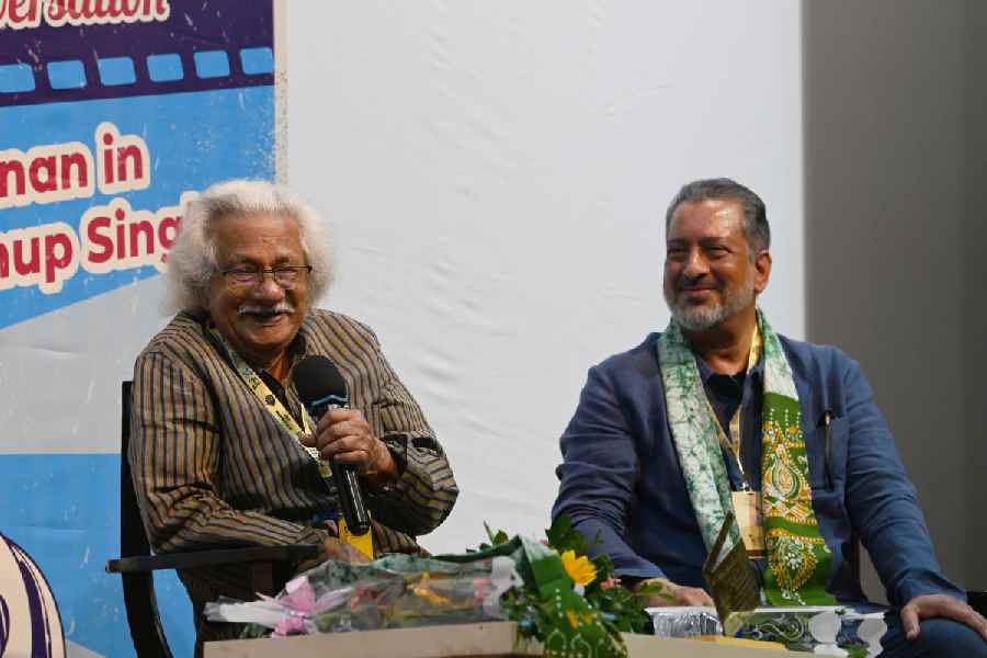 Adoor Gopalakrishnan, with Anup Singh (right), at Sisir Mancha for the first Ritwik Ghatak Memorial Conversation at the Kolkata International Film Festival on Wednesday.