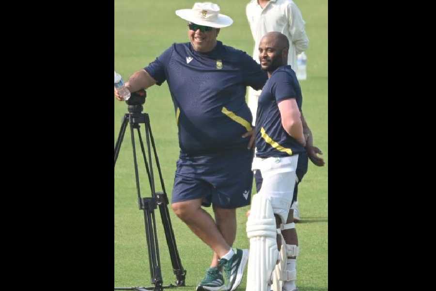 South Africa head coach Conrad Shukri with captain Temba Bavuma at Eden Gardens.