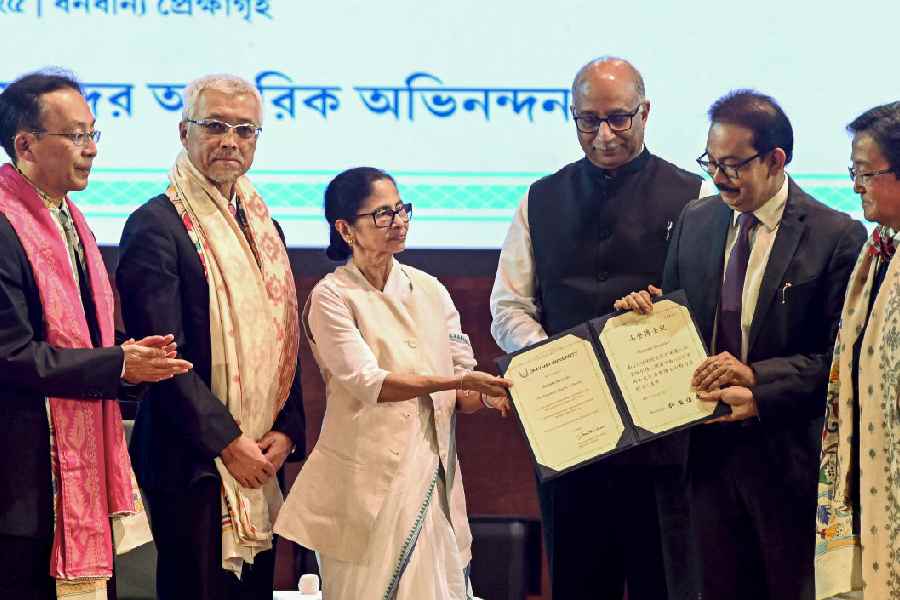 Mamata Banerjee receives the honorary D.Litt. from a professors’ delegation of Okayama University, Japan, in Calcutta on Wednesday.