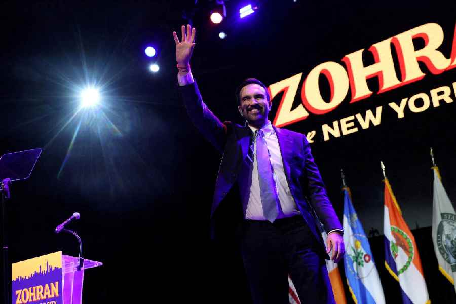 Democratic candidate for New York City mayor Zohran Mamdani waves on stage after winning the 2025 New York City Mayoral race, at an election night rally in the Brooklyn borough of New York City.