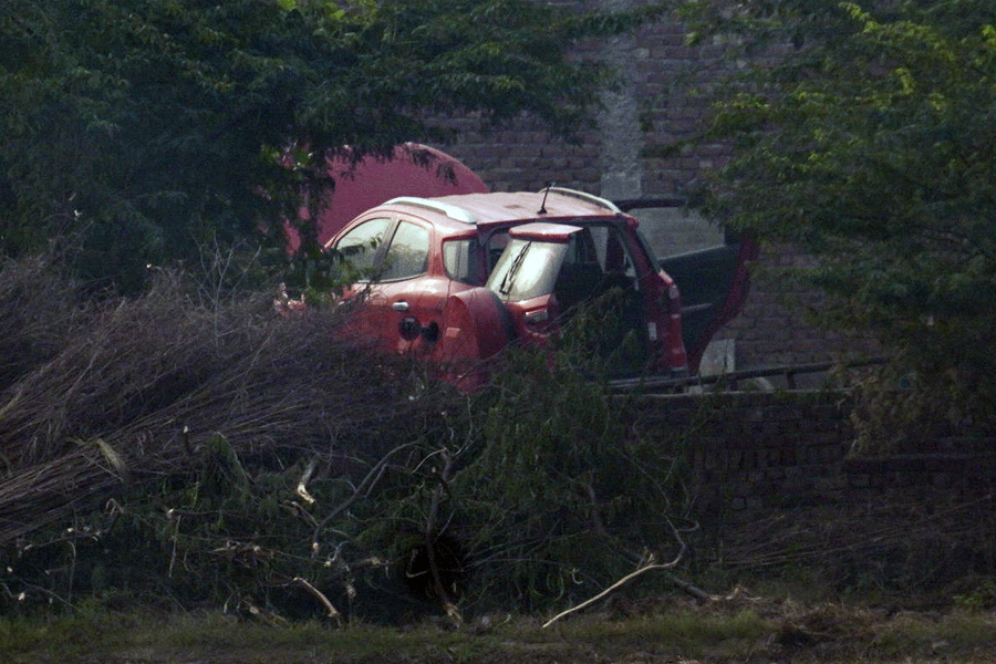 A red Ford EcoSport car suspected to be linked to the Delhi Red Fort blast case has been traced in Faridabad district's Khandawali, Thursday, Nov. 13, 2025.