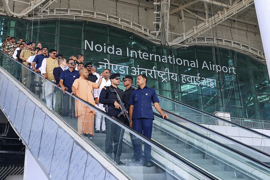 In this image posted on Oct. 30, 2025, Uttar Pradesh Chief Minister Yogi Adityanath inspected the development works of the under-construction 'Noida International Airport' in Jewar, Gautam Buddh Nagar district.