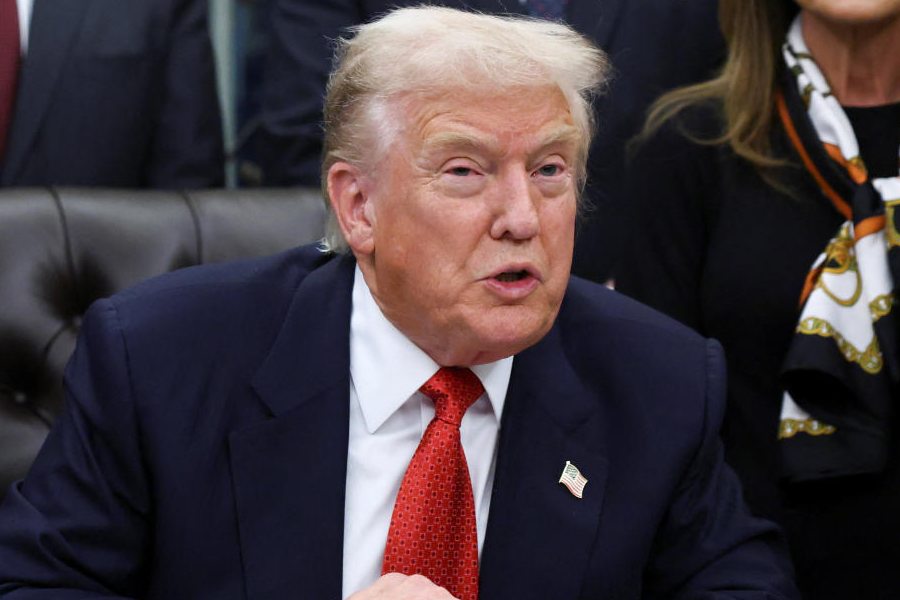 US President Donald Trump speaks inside the Oval Office, on the day he is expected to sign the funding bill to end the U.S. government shutdown, at the White House in Washington, D.C., November 12, 2025.