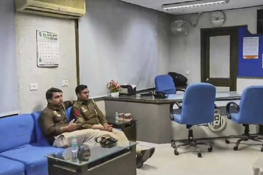 Police personnel at Al Falah University on Thursday. 