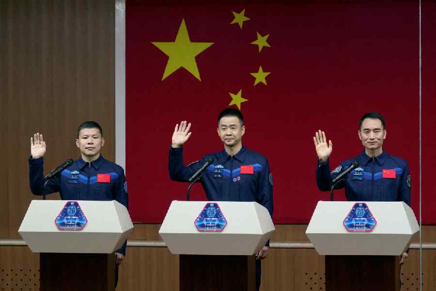 Astronauts Chen Dong, Chen Zhongrui and Wang Jie meet the press before the upcoming Shenzhou-20 spaceflight mission, at Jiuquan Satellite Launch Center near Jiuquan, Gansu province, China April 23, 2025.