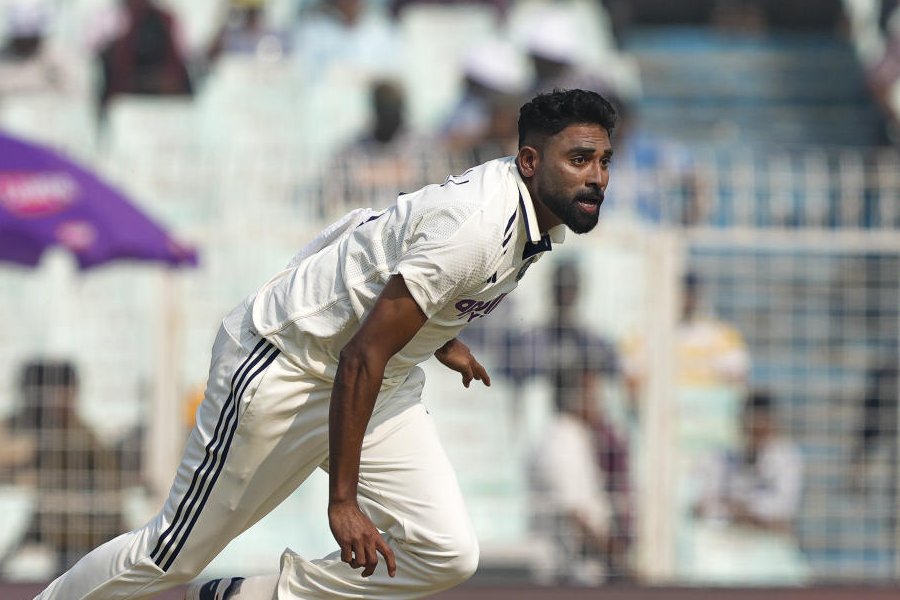 India's Mohammed Siraj bowls a delivery during day one of the first Test cricket match of a series between India and South Africa, at the Eden Gardens, in Kolkata, Friday, Nov. 14, 2025.