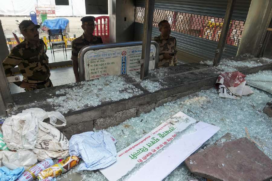 Security personnel keep vigil at a damaged portion of the Red Fort metro station amid high alert in the aftermath of a blast, in New Delhi, Thursday, Nov. 13, 2025.
