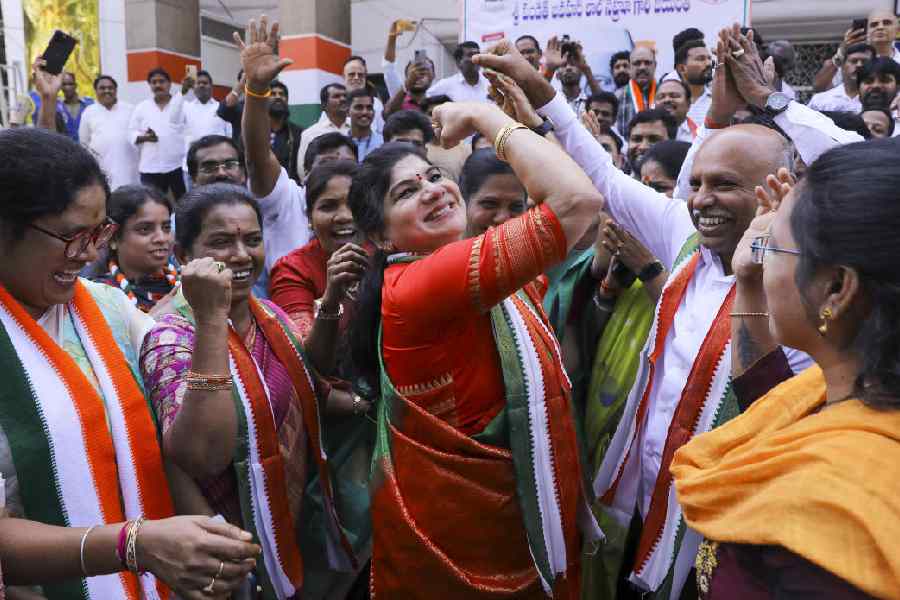 Congress workers celebrate the Jubilee Hills Assembly bypoll victory at Gandhi Bhavan in Hyderabad on Friday.