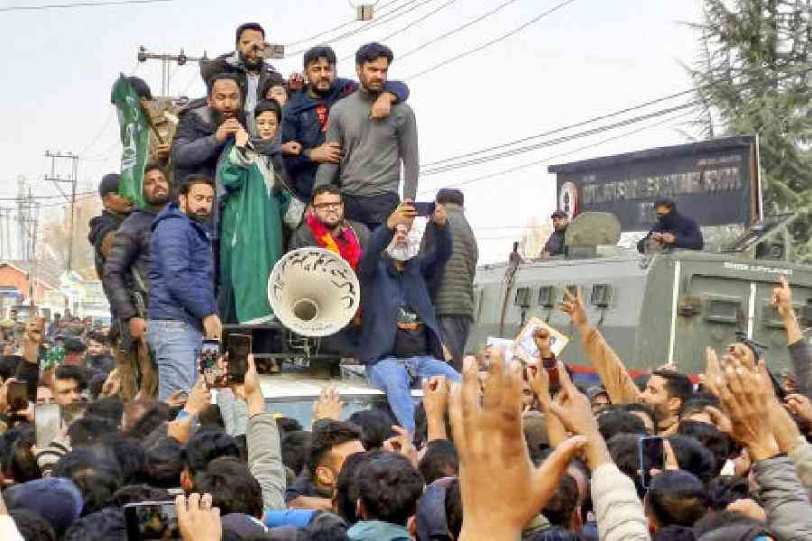PDP leader Iltija Mufti and party candidate Aga Syed Muntazir celebrate the victory with party workers in Budgam on Friday. (PTI)
