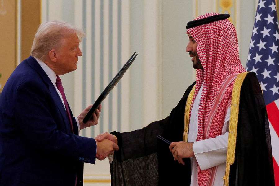 Saudi Crown Prince Mohammed Bin Salman with US President Donald Trump during the Saudi-U.S. Investment Forum, in Riyadh