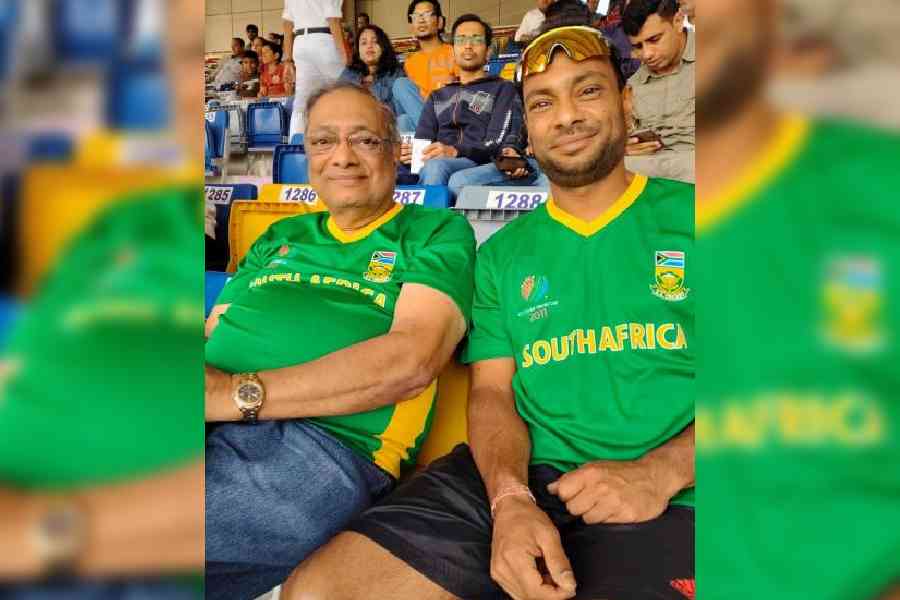 Fan family: Proteas fans Ravi Vittal and his son Vishaan at the Eden Club House upper tier on Friday. Picture by Sayak Banerjee 