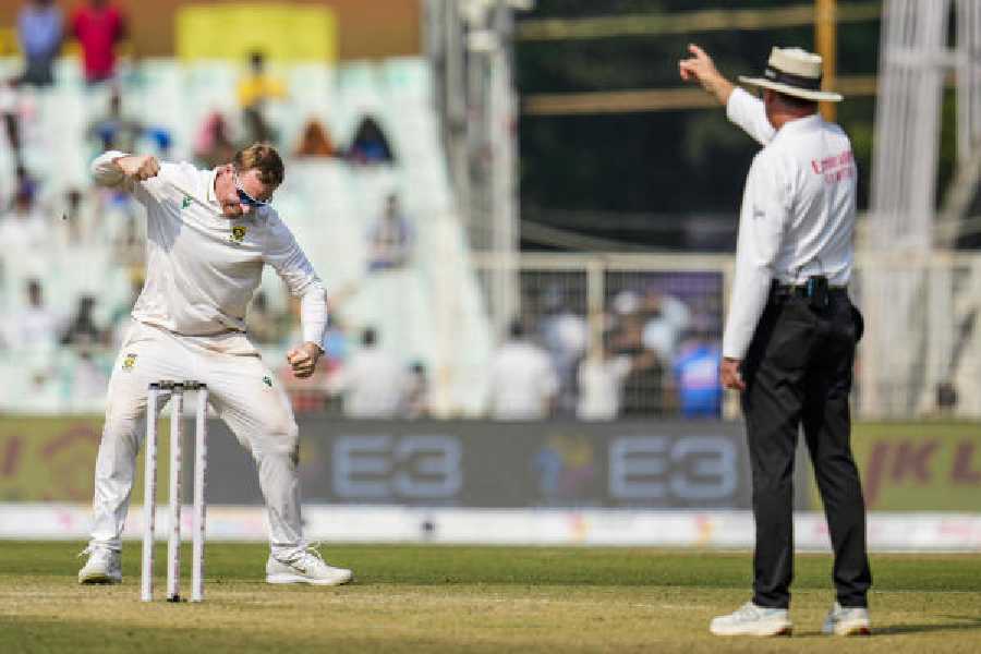 South Africa's Simon Harmer celebrates the wicket of Ravindra Jadeja at the Eden Gardens on Saturday.