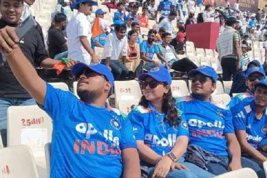 Fans click a selfie during the Test match
