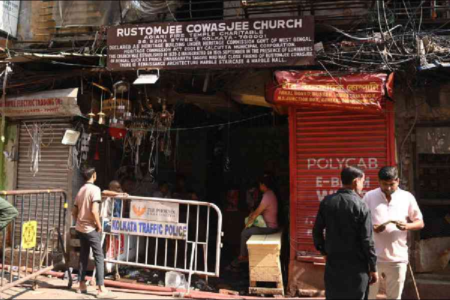 The entrance to the fire-ravaged Rustomjee Cowasjee Church on Ezra Street blocked by a guardrail on Sunday afternoon. Picture by Bishwarup Dutta