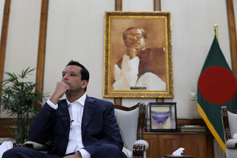 FILE PHOTO: Sajeeb Wazed, son of the Prime Minister Sheikh Hasina and the Information and Communication Advisor of Bangladesh government, looks on during an interview with Reuters at the Prime Minister's residence in Dhaka.